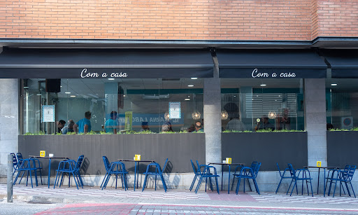 Com a casa